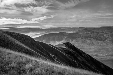 Grayscale Photo of Mountain Range thumbnail