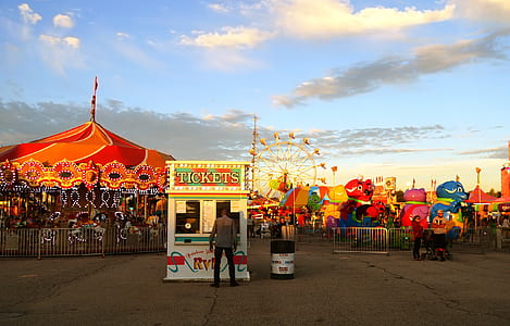 person buying ticket in carnival thumbnail