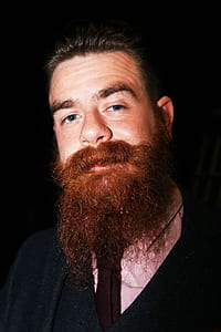 man wearing black and pink top thumbnail