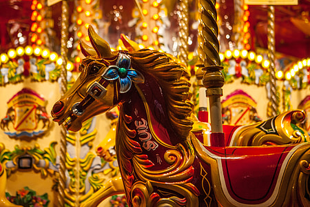 Brightly coloured fairground carousel horse thumbnail