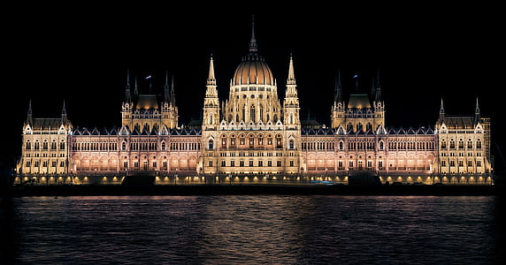 lighted brown building during night time thumbnail