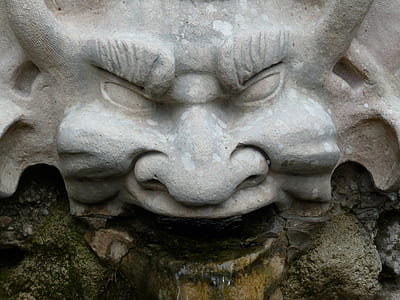 gray devil statue thumbnail