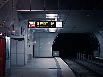 empty subway train station with turned-on signage thumbnail