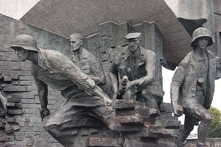 four soldier concrete statues thumbnail