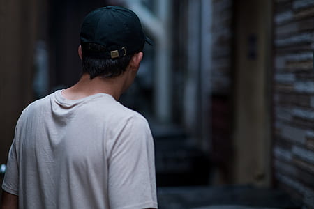 man standing at the alley thumbnail