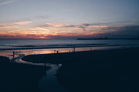 Silhouette Photo of Sea during Golden Hour thumbnail