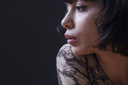 shallow focus photography of woman in black and brown top thumbnail