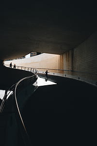 child running on concrete tunnel during daytime thumbnail