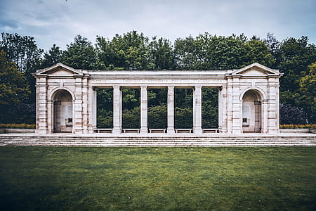 white stone building surrounded by trees thumbnail