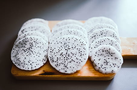 round pastries on brown wooden plate thumbnail