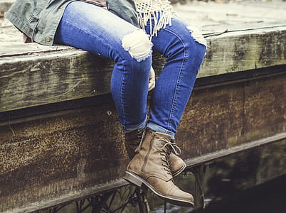 person sitting on bridge thumbnail