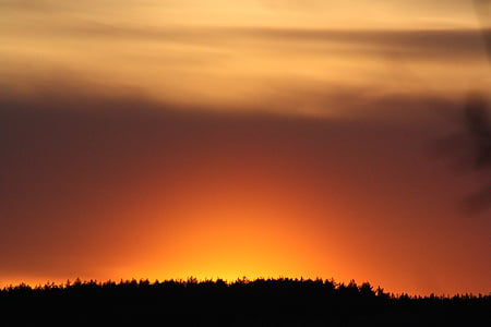 silhouette of mountains during golden hour thumbnail