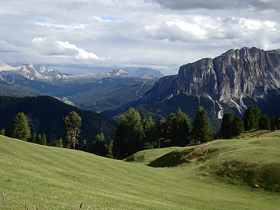 mountains under cloudy sky thumbnail