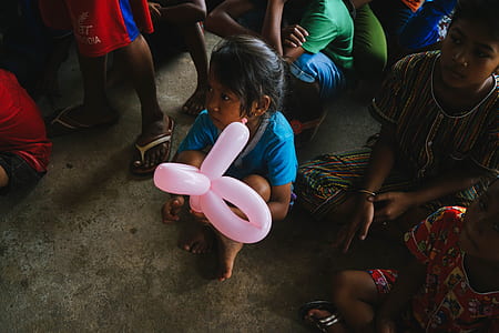 girl holding pink balloon thumbnail