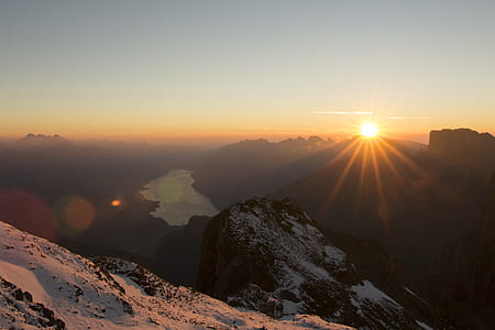 aerial photo of glacier mountain during sunrise thumbnail