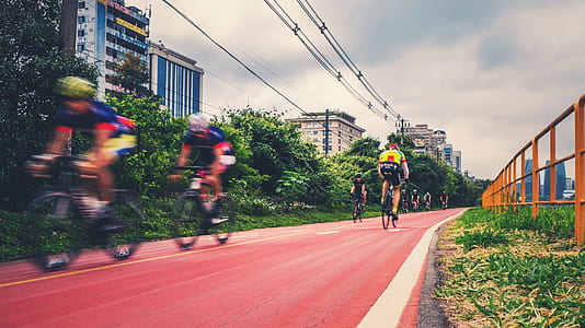 person driving bike during daytime thumbnail