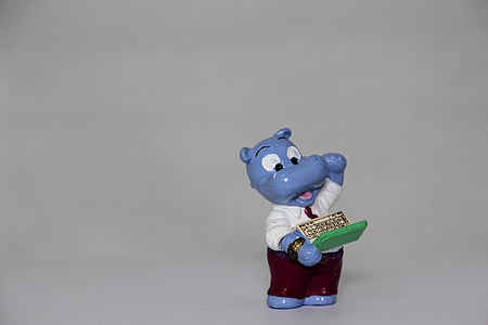 blue ceramic hippo figurine thumbnail