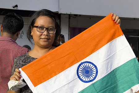 woman holding India flag thumbnail