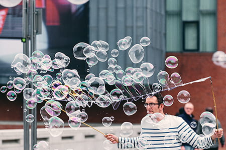 man playing water bubbles thumbnail