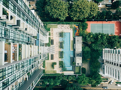 bird's eye view photo of pool near tennis court thumbnail