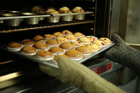 person taking the cupcake in oven thumbnail