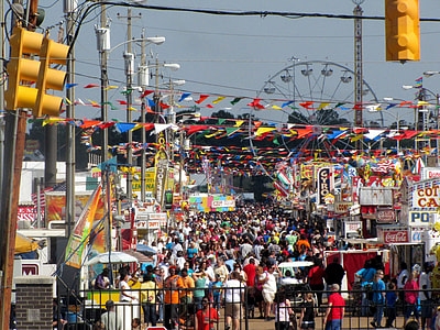 people gathering near ferris wheel thumbnail
