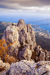 Beige Rock Mountain With Bridge thumbnail