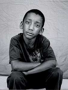 boy wears short-sleeved shirt thumbnail