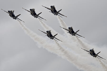 six fighter planes under nimbus clouds thumbnail