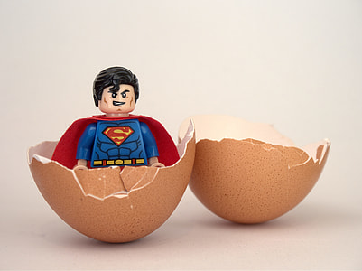 LEGO Super Man mini figure on brown organic egg thumbnail