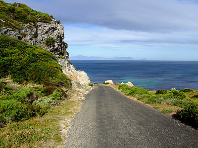 road near cliff and sea thumbnail