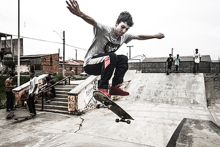 boy playing skateboard doing ollie thumbnail