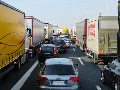 closeup photo of silver Audi vehicle stranded on traffic during daytime thumbnail