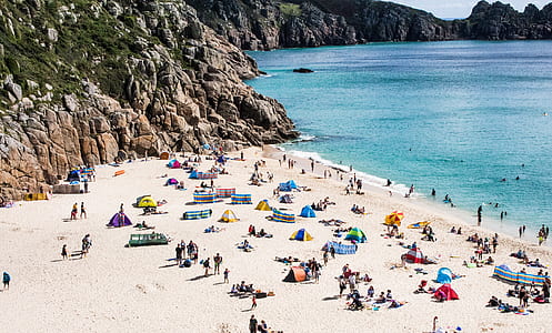 bird's-eye view photography of people on beach thumbnail
