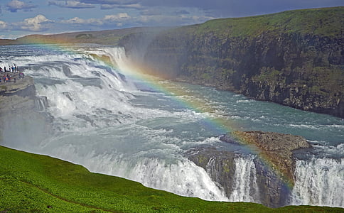 rainbow above waterfall thumbnail