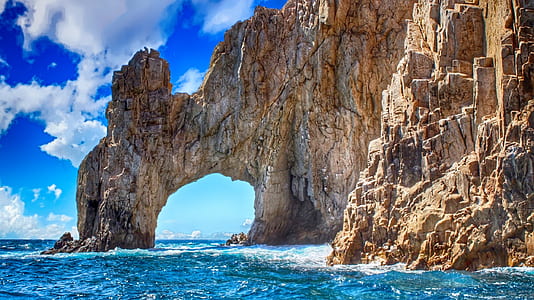 arch formation on cliff near the sea thumbnail