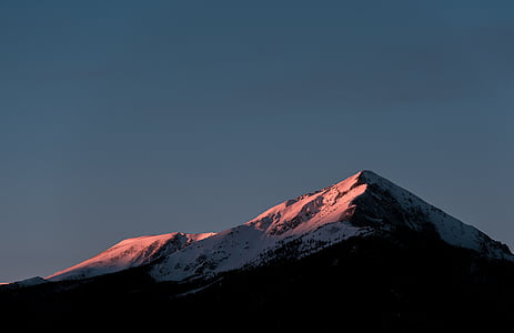 snow covered mountain during daytime thumbnail