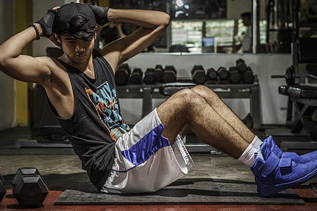 Man In Black Tank Top Inside Gym thumbnail
