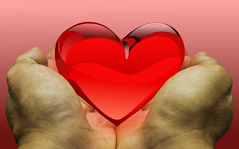 hand holding crystal heart thumbnail