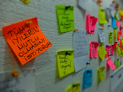 assorted-color sticky notes on white surface thumbnail