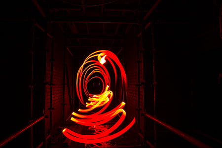 steel wool photography of red light inside tunnel thumbnail