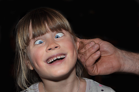person twisting girl's ear thumbnail