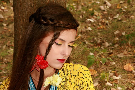 woman laying her back at tree thumbnail