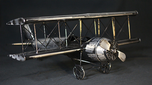 gray biplane scale model thumbnail