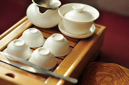 white ceramic bowls on brown wooden tray thumbnail