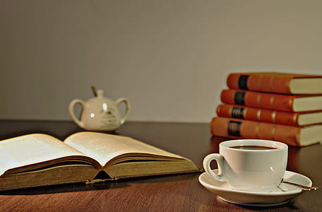 photo of white ceramic mug with saucer thumbnail