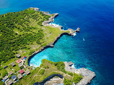 aerial photo of an island during daytime thumbnail