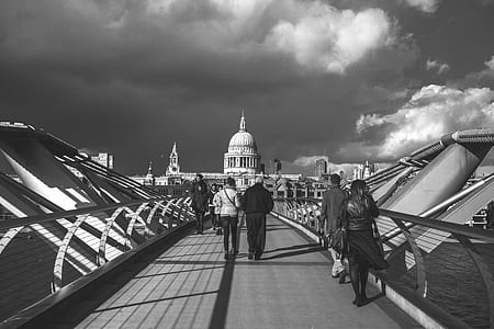 Grayscale Photo of People Walking in Pathway thumbnail