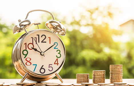 round silver analog alarm clock thumbnail