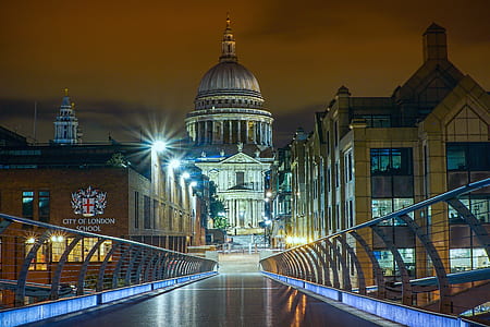 brown and white concrete buildings during nighttime thumbnail